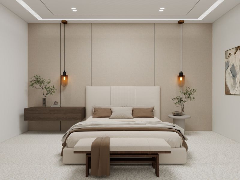 Schlafzimmer mit Doppelbett, Hängelampen und Holzelementen in einem Einfamilienhaus.