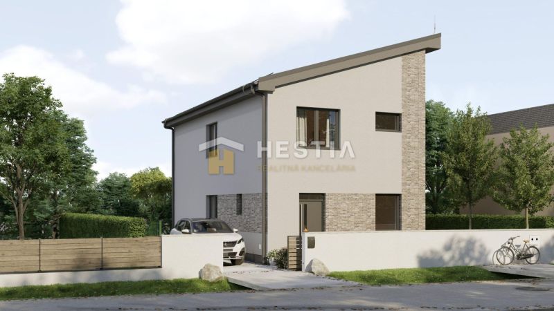 Ein Einfamilienhaus in Cerová mit weißer Fassade, modernem Design und gepflegtem Garten.
