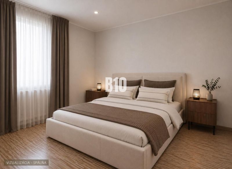 Schlafzimmer in einer 3-Zimmer-Wohnung mit hellen Wänden und einem Boden in Holzoptik.
