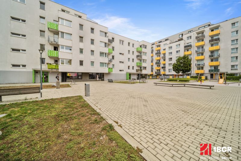 In Bratislava - Dúbravka on Pri Hrubej lúke street, apartment buildings and a playground.