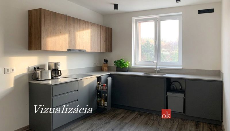 Küche in einer Einzimmerwohnung mit Holzboden und Küchenzeile.