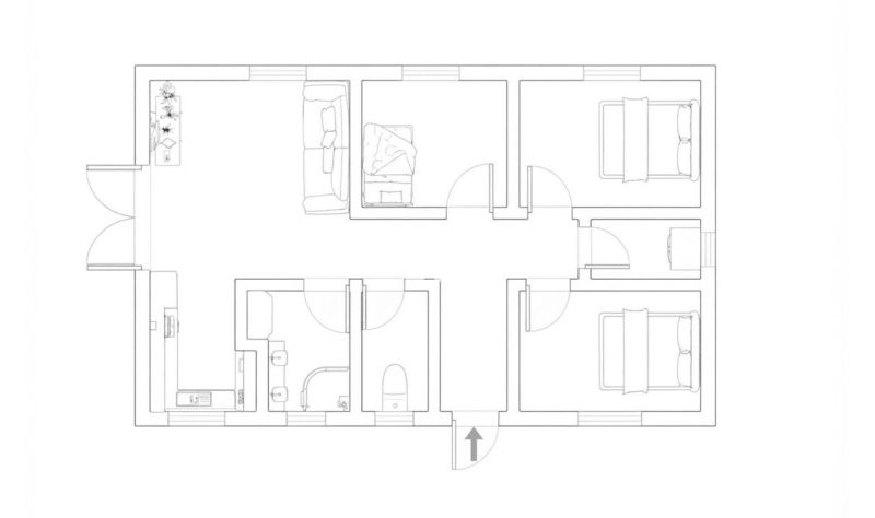 Grundriss eines Einfamilienhauses in Čeľadice mit drei Schlafzimmern und einem Wohnzimmer.