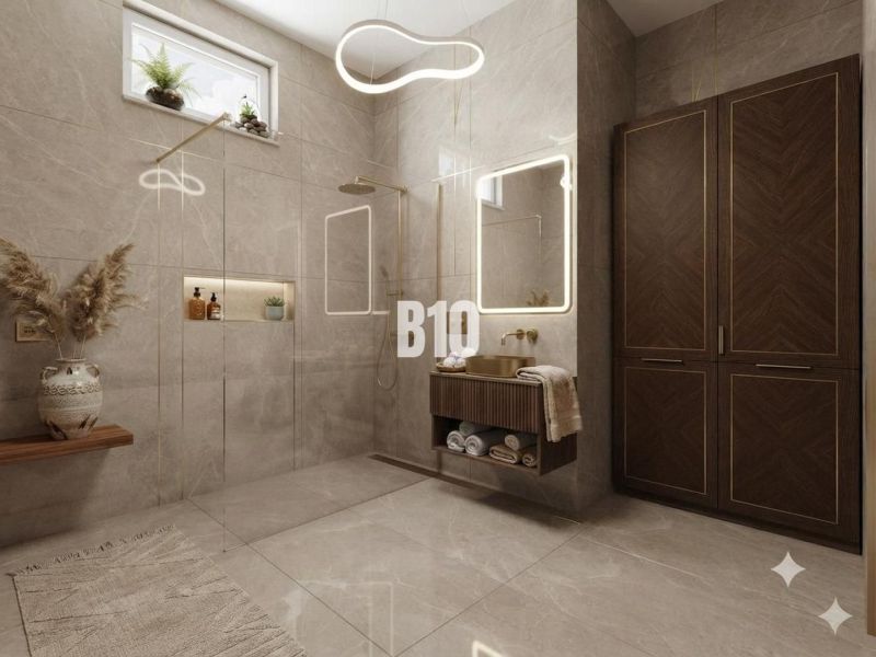 Badezimmer in einem Einfamilienhaus mit großen Schränken und Spiegel.