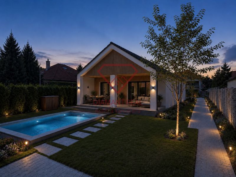 Ein Einfamilienhaus in Veľká Mača in Veľká Mača mit einem Pool bei Sonnenuntergang.