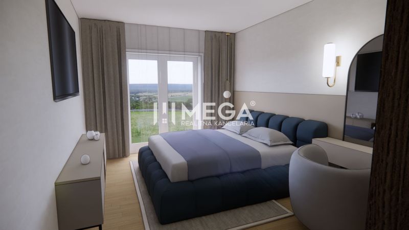 Schlafzimmer im Einfamilienhaus mit Bett, Fernseher und Boden in Holzoptik.
