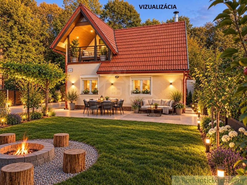 Eine Hütte in Nové Zámky, wunderschöne Gartenbeleuchtung, Terrasse und Feuerstelle im Vordergrund.