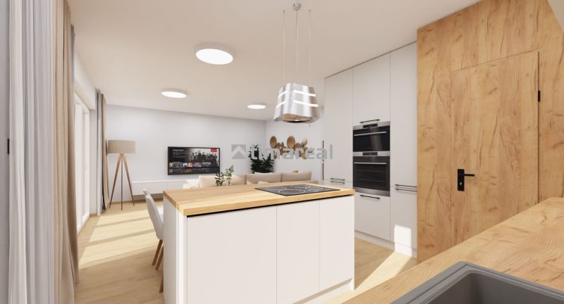 Küche und Wohnzimmer mit Holzboden in einem Einfamilienhaus.