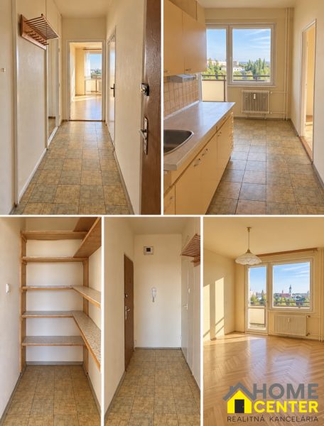 Flur und Küche in einer 2-Zimmer-Wohnung mit Stadtblick, Boden mit Holzdekor.