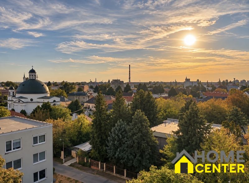 Blick auf Komárno bei Sonnenuntergang, ideal für eine 2-Zimmer-Wohnung.